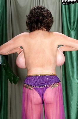 21P Mature belly dancer Diane Poppos reveals her massive juggs in a solo