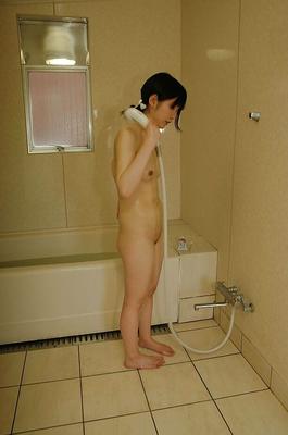 16P Sassy asian teen taking shower and rubbing her slit in close up