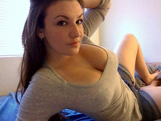 12P Teens huge double d tits are almost popping out of her tight bra
