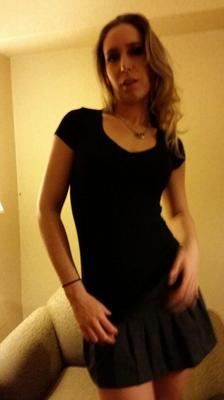 15P Lovely amateur babe WouJ poses in her black shirt and sexy mini skirt