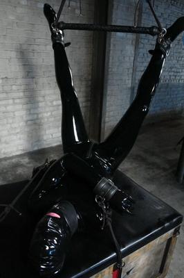17P Dominatrix Claire Adams fucks her rubberboy in the ass with a huge strapon