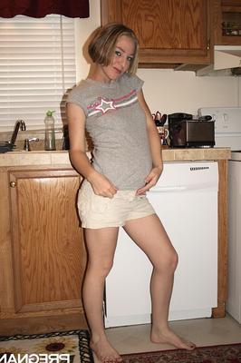 16P Pregnant amateur Kristi makes her nude debut while in the kitchen