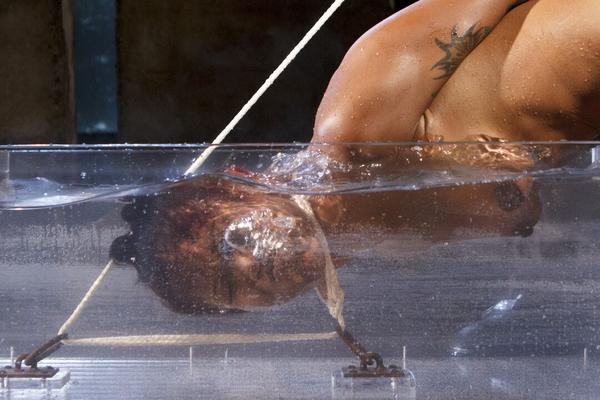 21P Sweet ebony Lotus Lain gets tied up and abused in harsh water bondage action