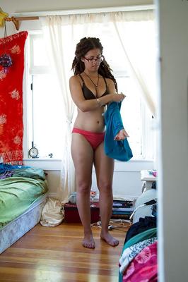 16P Busty amateur Christina takes off pantie sand lets saggy boobs hang