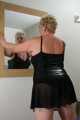 21P Blonde mature with a fat butt Nicole A strips and toys her juicy twat