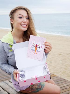 12P Misha is a naughty bikini model who loves to unwrap new gifts and show of her
