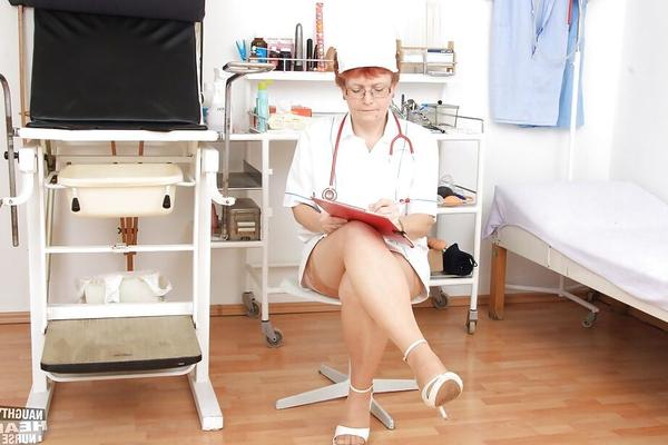 16P Mature nurse in glasses fingering her bushy twat and tasting her juices
