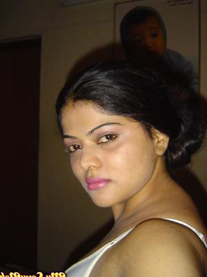15P Indian female Neha uncovers big naturals and large areolas during self shots