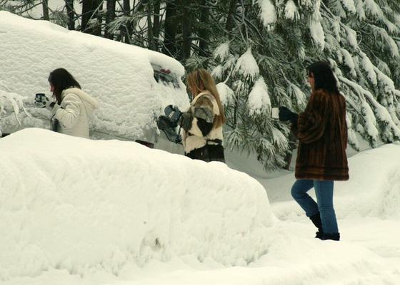 10P Three big boobed stunners pose braless in their fur coats in the snow
