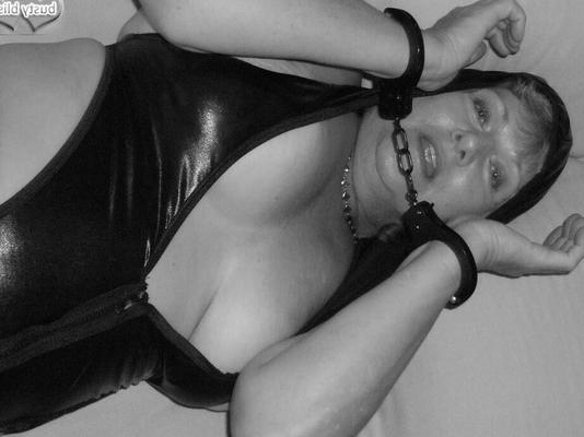 20P Mature woman Busty Bliss is handcuffed before showing her big natural tits