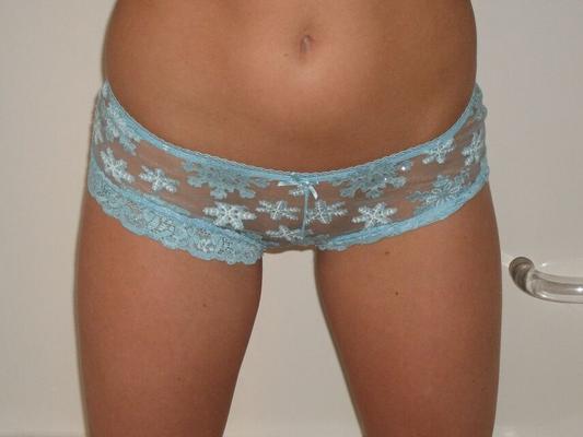12P Young blonde shows her firm breasts while wearing lace underwear