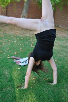 21P Amateur cutie with glasses Orianna gets naked while doing exercises outdoors