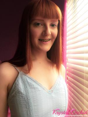 15P Tiny redheaded teen with braces Krystal Orchid reveals her innocent puffy cunt