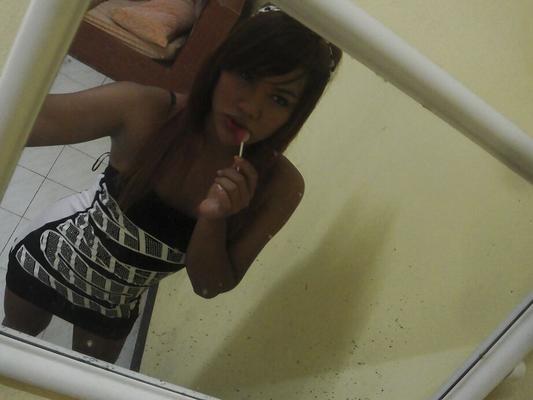 16P Cute redhead Asian ladyboy Tonkra playing with herself outdoors
