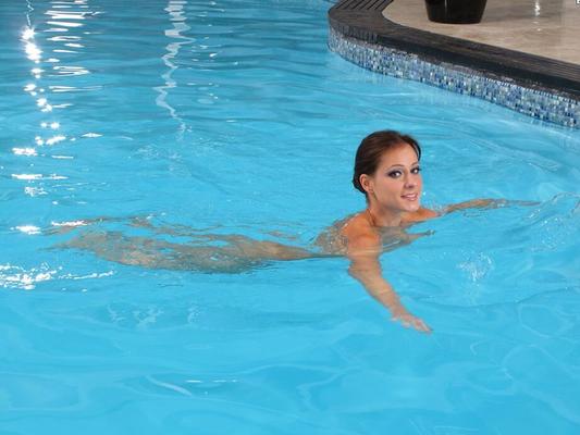15P Seductive brunette hottie Lexa undresses and takes a swim in the nude