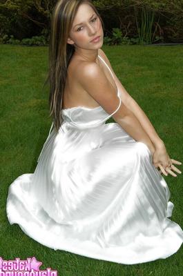 12P Amateur model covers up her boobs after taking off her dress on the lawn