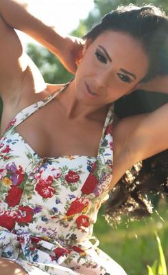 12P First timer Danni Fernandez bares her firm tits while getting naked on a patio