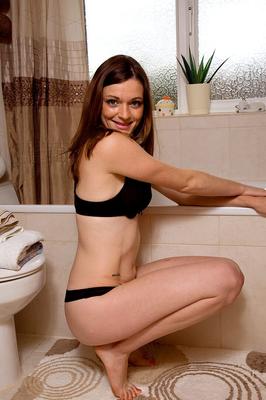 13P First timer removes a black bra and panty set before showering