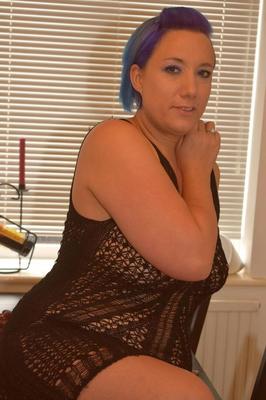 16P Overweight amateur Sara Banks eats a banana while showing her tits and twat