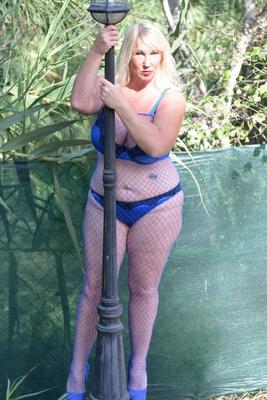 16P Blonde granny Melody touches her huge tits outdoors in a mesh bodystocking