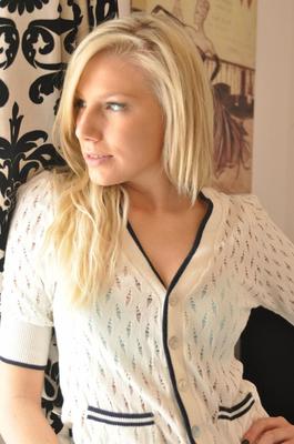 12P Sexy blonde female Danielle Maye looks out a window after getting naked