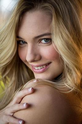 15P Hot blonde teen Kenna James takes off her lingerie on top of a bed