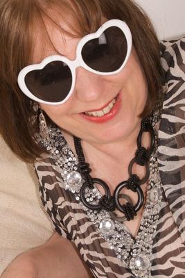20P Mature woman Dirty Doctor takes a piss in a toilet before posing nude in boots