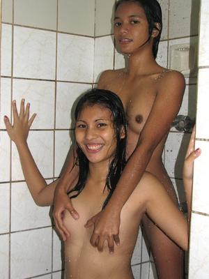 12P Wet Asian teens partake in lesbian relations while having a shower