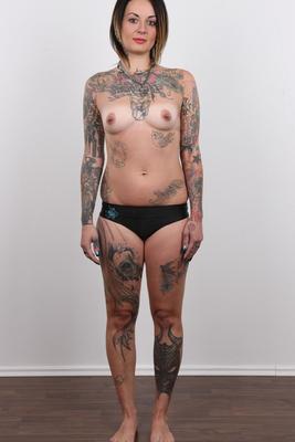 20P Tattooed Martina has her pierced pussy photographed naked for porn debut