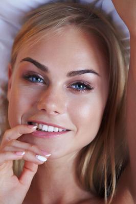 21P Blonde chick with a very pretty face Nancy A gets naked on her bed