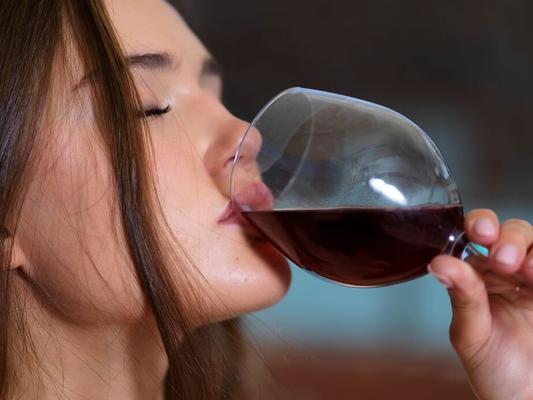 16P Skinny teen Sonya Blaze drinks a glass of red wine while modelling in the nude
