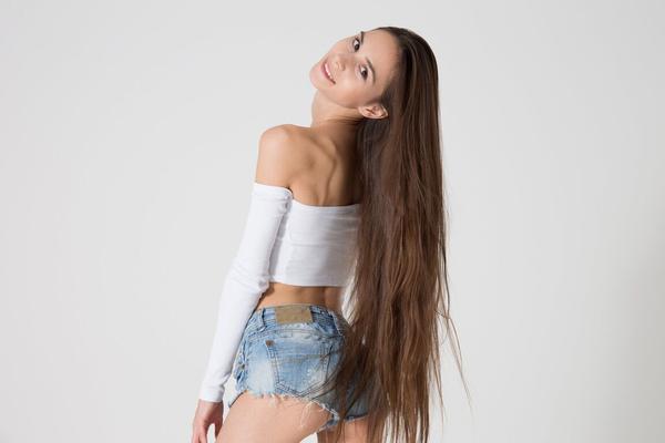21P Brunette Russian teen Leona Mia flaunts her skinny body in a hot striptease