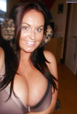 16P Buxom brunette babe Sarah Nicole Randall posing topless with ear muffs