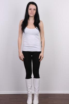20P Dark haired girl Natalia stands clothed before doing the same in the nude