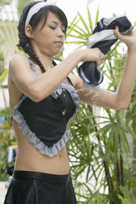 16P Slim Asian girl gets naked while washing her attire in the courtyard