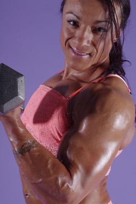 15P Female bodybuilder Karen Garrett flexes her muscles in lingerie