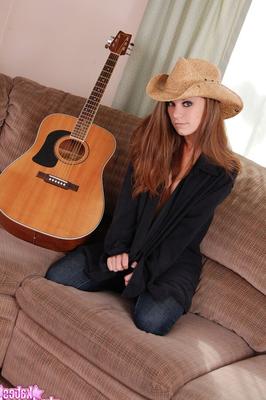 12P Barefoot country girl puts down her guitar and exposes her bra