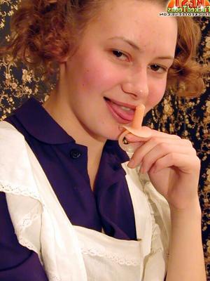 18P Young looking Russian redhead slides upskirt panties aside to show bald twat