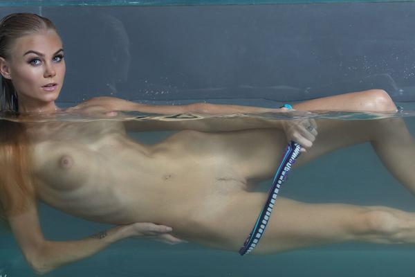 16P Wet teen Nancy A removes her bikini bottoms while modeling in water