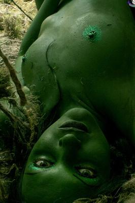15P Solo girl with green skin wanders around the woods with no clothes on