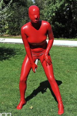 21P Kinky slut Sandy K poses & masturbates poolside fully covered by a latex suit