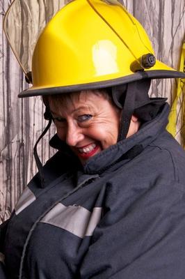 20P Mature fatty doffs her firefighter clothing to show her twat in stockings