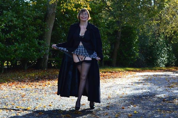 16P Middle-age amateur Barby Slut exposes herself in a long coat in public places