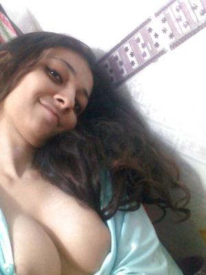 10P Indian solo girl holds her face firm while letting nipples free of lingerie