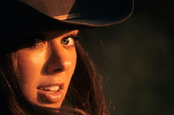 14P Mature cowgirl Claire Rambeau shows off her small natural tits outdoors