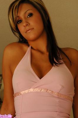 12P Amateur model Rio displays her nice legs in a tight fitting dress