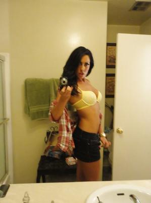 16P Brunette slut Tiffany Brookes taking mirror self shots while undressing