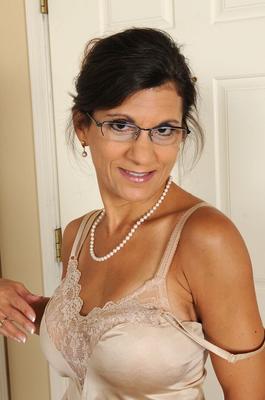 11P Older brunette woman Tori Baker in glasses showing big tits & hairy bush