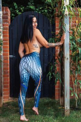 12P UK model Kelli Smith displays her fake tits while removing tight pants