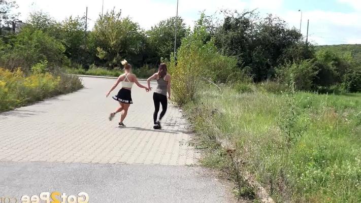 15P Hot lesbian joggers Vicky & Chrissy pause to squat for a pee on the path